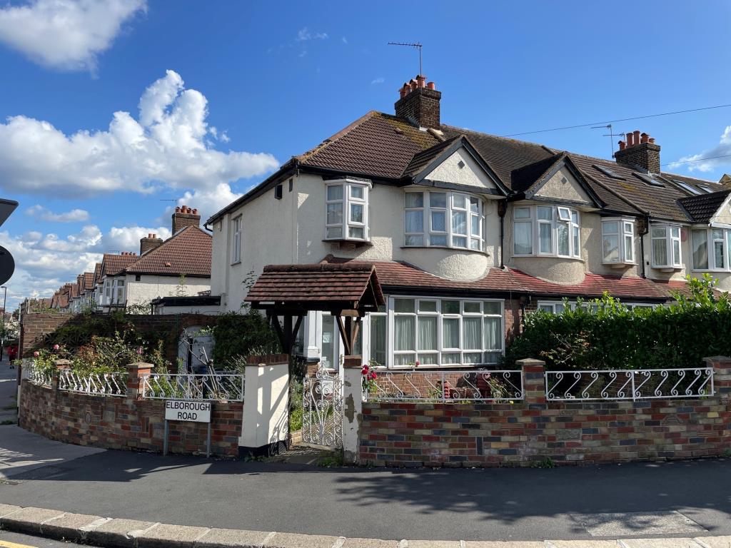 Lot: 7 - THREE-BEDROOM END-TERRACE HOUSE FOR IMPROVEMENT - street view of 3 bed end terrace house